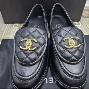 CHANEL Quilted Black Loafers with Gold Logo
